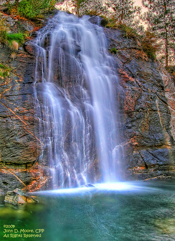 The Mirabeau park waterfall just after sunset, in the city of Spokane Valley.