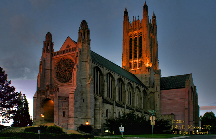 A setting sun lights up the Cathedral of Saint John the Evangelist on south Grand Blvd.