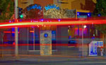     An ambulance passes the Bluefish, Sprague and Lincoln in downtown, 