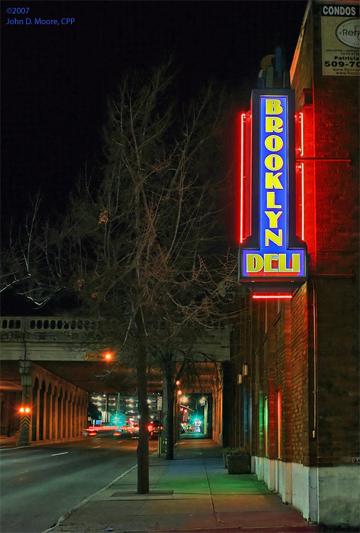 Southbound, passing the Brooklyn Deli on the west side of Monroe street. Spokane night photos