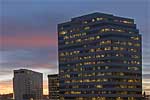 A  sunset view toward the Bank of America building and Wells Fargo, from the rooftop of the Fernwell building.  Spokane, Washington