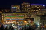 A view into downtown Spokane, shot from the top of Spokane's Riverfront Park Clocktower.  The Parkade is the very colorful structure in the center of the image.  Spokane, Washington.