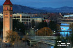 In Spokane's Riverfront Park, daylight transitions into darkness. 