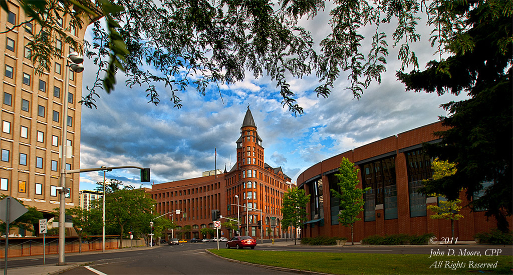 Ground level view of the Cowles Building (center), on Spokane's west Riverside Avenue