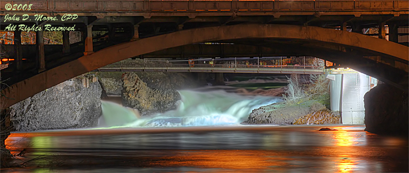 The Spokane River's North river channel flows under the Post Street Bridge.