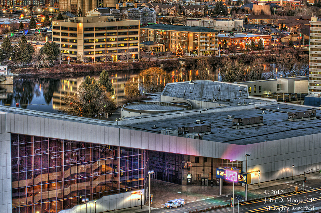 A  view of the INB Performing Arts Center, and the Spokane River, from the rooftop of the Old National Bank building.   