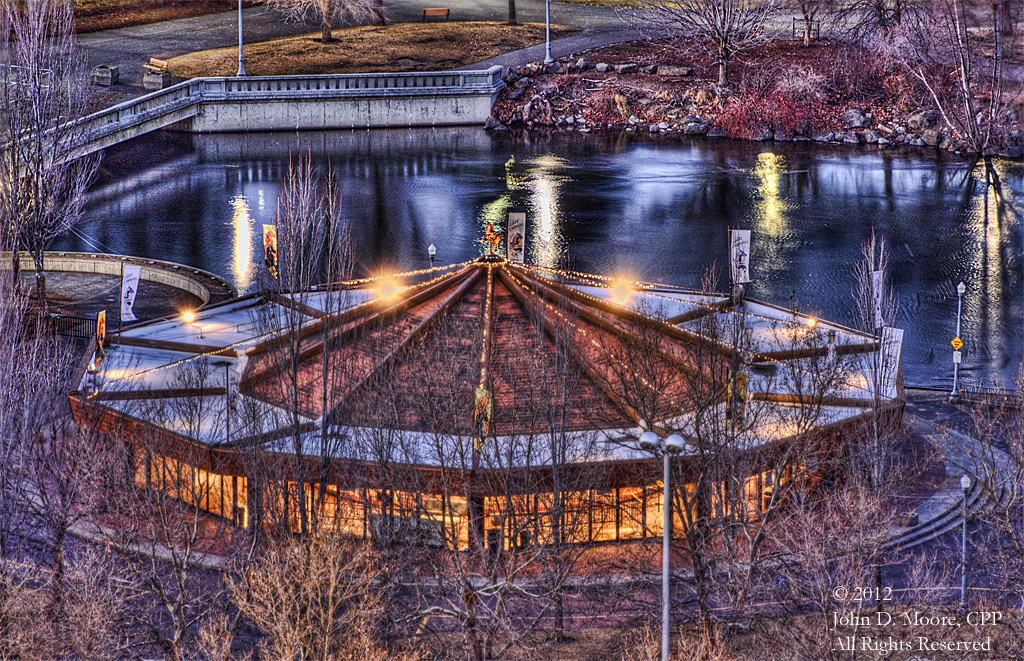 A cold and winter view of Riverfront Parks Loof Carousel, from the rooftop of the Old National Bank building.