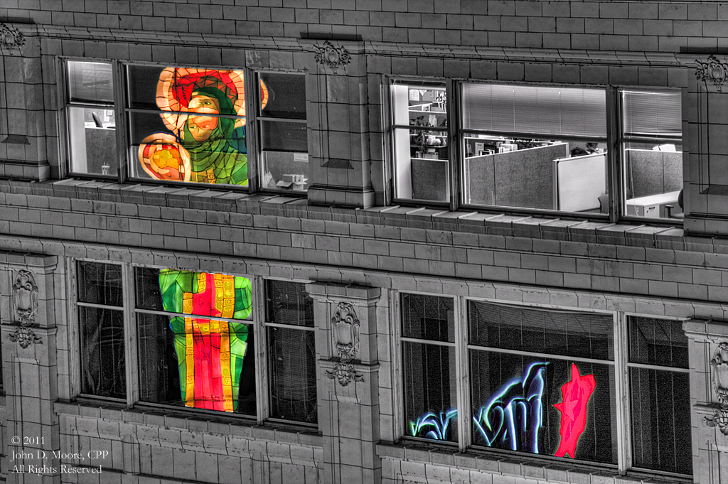 The Macy's reflections in the windows of the Crescent building in downtown  Spokane