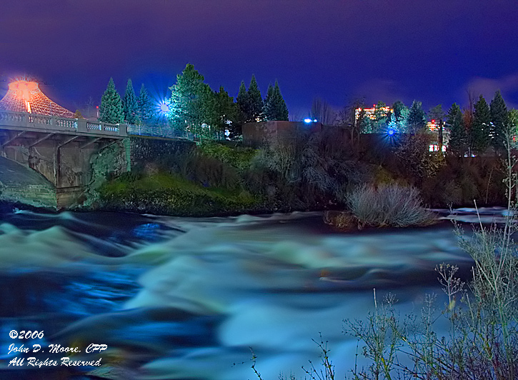 North river channel,  with a swollen Spokane River, Spokane, Washington