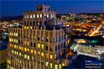 A cold and winter view of the Paulsen building, from the rooftop of the Old National Bank building.  