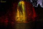 The Mirabeau park waterfall in total darkness, in the city of Spokane Valley.