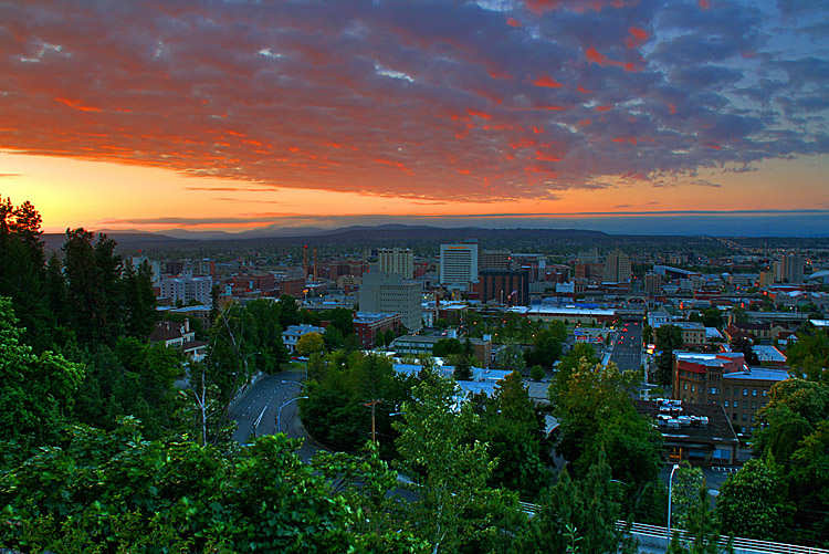 A red sky at sunset, overlooking downtown Spokane.  Spokan Night Photos