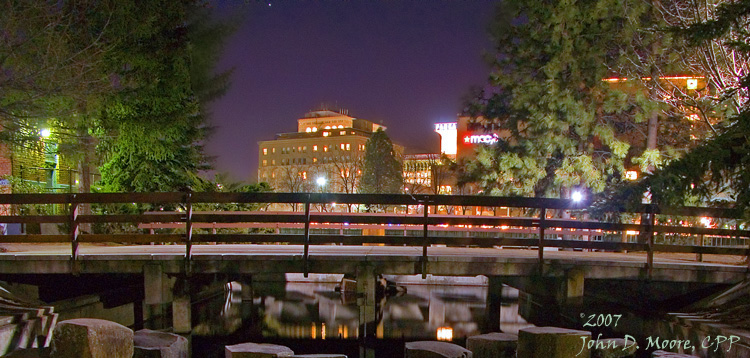 Cold and starry night,  reflections pool at Riverfront park on the Spokane river, Spokane, Washington