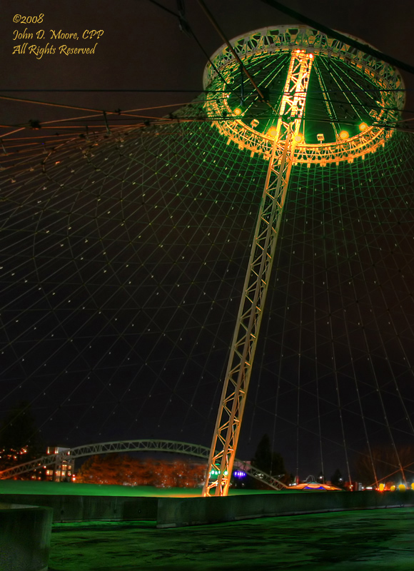 At the former US Pavillion in Spokane's Riverfront Park, the Pavillion lights are transitioning from green to gold